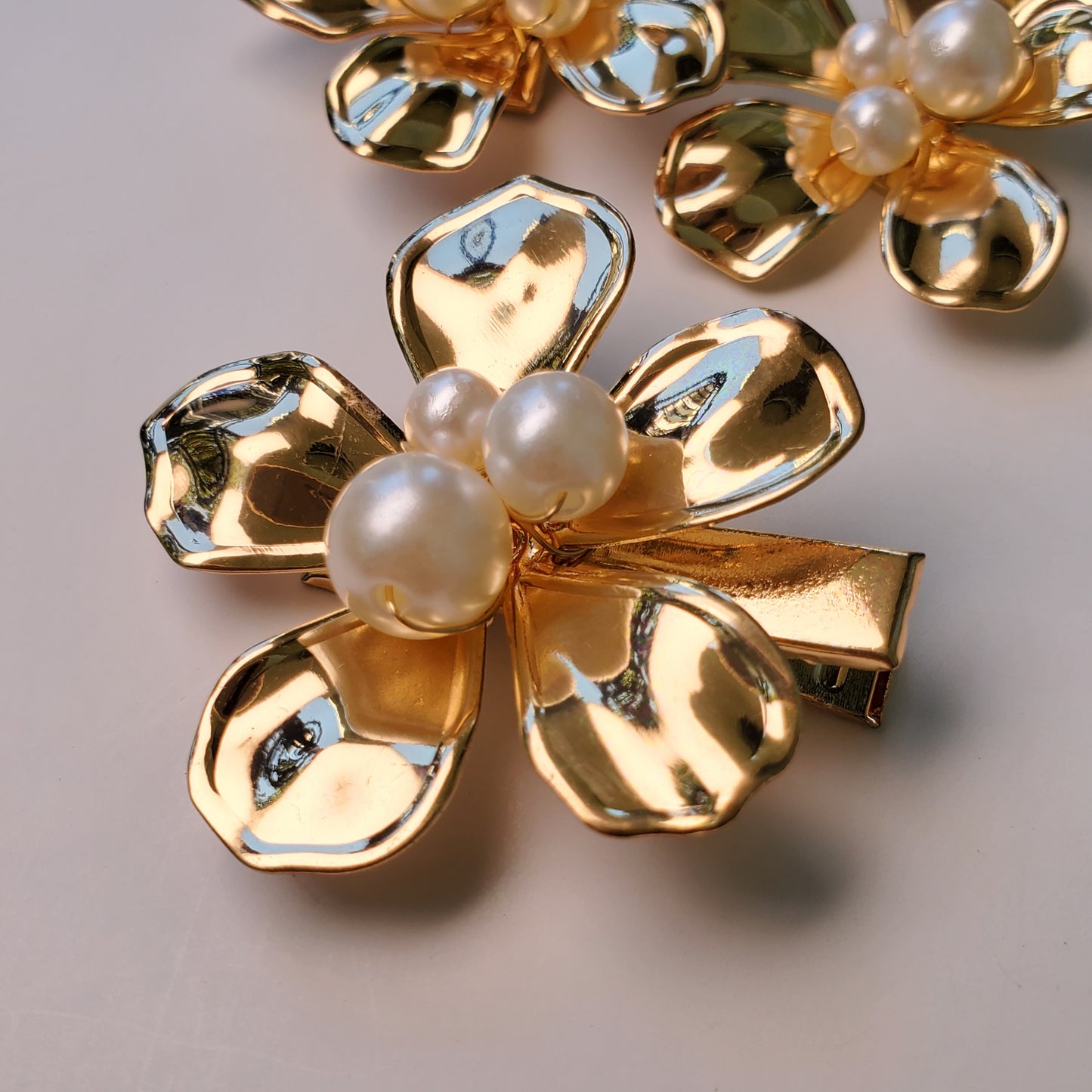 Golden hair pins